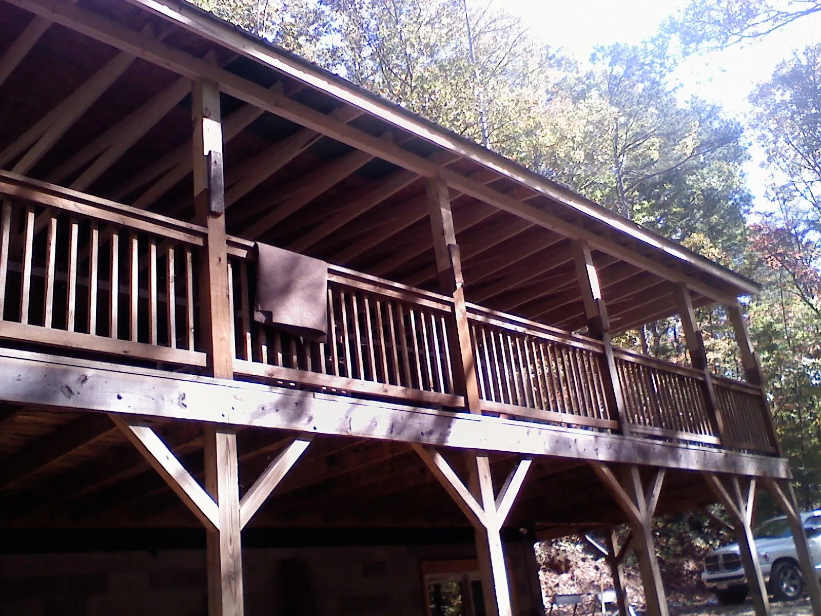Timber framing under a new elevated porch and deck — Roof Leak Repair in Saugatuck by Roofing Brothers
